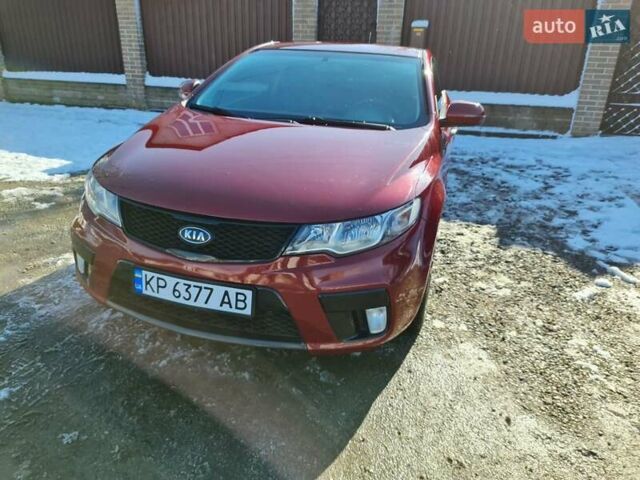 Червоний Кіа Черато, об'ємом двигуна 2 л та пробігом 200 тис. км за 8300 $, фото 23 на Automoto.ua
