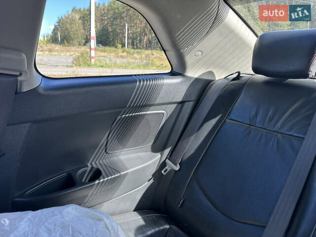 Красный Киа Черато, объемом двигателя 2 л и пробегом 160 тыс. км за 6899 $, фото 118 на Automoto.ua