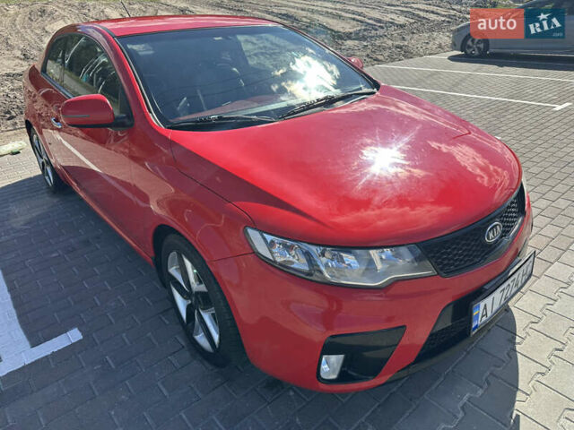 Красный Киа Черато, объемом двигателя 2 л и пробегом 160 тыс. км за 6899 $, фото 2 на Automoto.ua