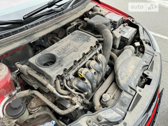 Червоний Кіа Черато, об'ємом двигуна 2 л та пробігом 98 тис. км за 9300 $, фото 82 на Automoto.ua