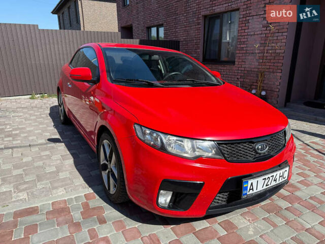 Красный Киа Черато, объемом двигателя 2 л и пробегом 160 тыс. км за 7600 $, фото 2 на Automoto.ua