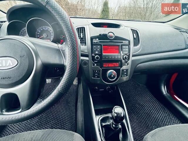 Красный Киа Черато, объемом двигателя 1.6 л и пробегом 293 тыс. км за 7100 $, фото 14 на Automoto.ua