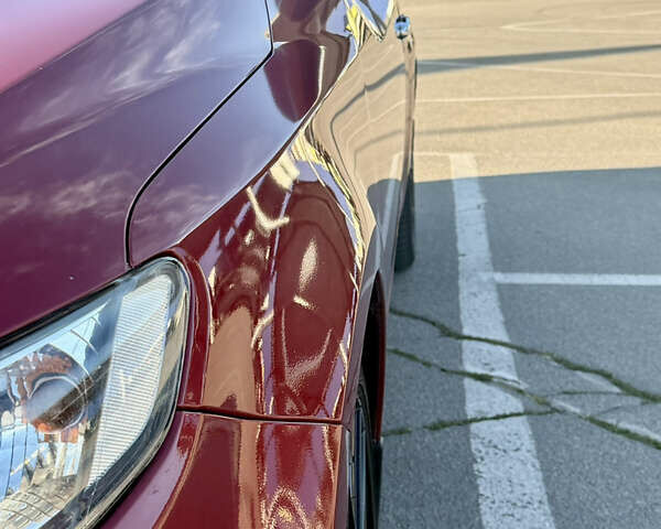 Красный Киа Черато, объемом двигателя 2 л и пробегом 155 тыс. км за 8900 $, фото 8 на Automoto.ua