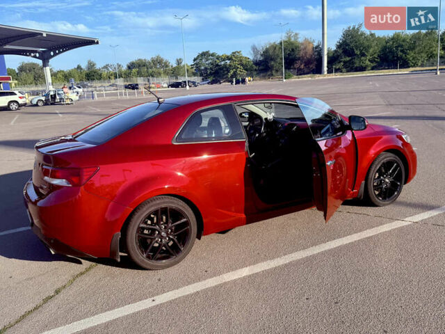 Красный Киа Черато, объемом двигателя 2 л и пробегом 155 тыс. км за 8900 $, фото 6 на Automoto.ua