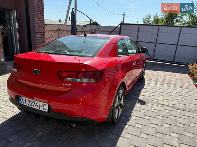 Красный Киа Черато, объемом двигателя 2 л и пробегом 160 тыс. км за 7600 $, фото 5 на Automoto.ua