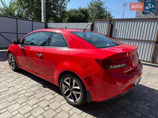 Красный Киа Черато, объемом двигателя 2 л и пробегом 160 тыс. км за 7600 $, фото 14 на Automoto.ua