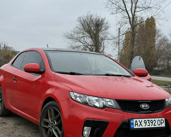 Червоний Кіа Черато, об'ємом двигуна 2 л та пробігом 124 тис. км за 8000 $, фото 1 на Automoto.ua