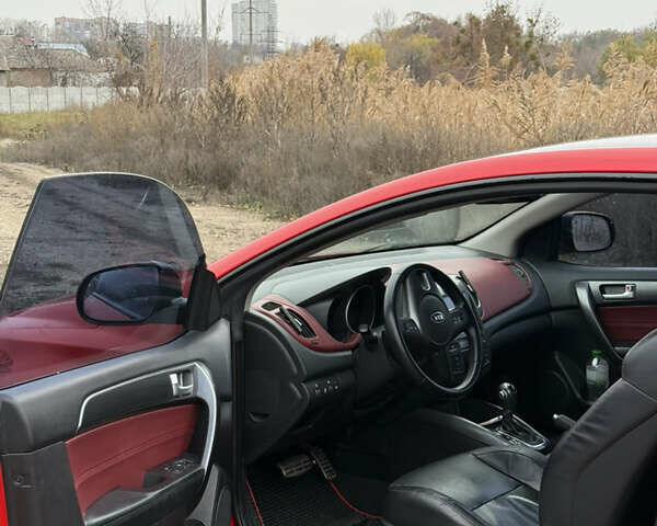 Червоний Кіа Черато, об'ємом двигуна 2 л та пробігом 124 тис. км за 8000 $, фото 5 на Automoto.ua