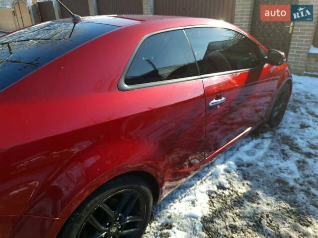 Червоний Кіа Черато, об'ємом двигуна 2 л та пробігом 200 тис. км за 8300 $, фото 3 на Automoto.ua