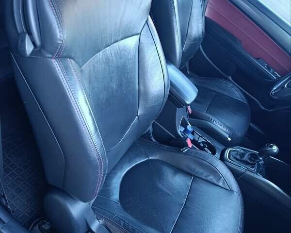 Киа Черато 2011 в Киеве на Automoto.ua Красный Киа Черато, объемом двигателя 2 л и пробегом 220 тыс. км за 8600 $, фото 12 на Automoto.ua