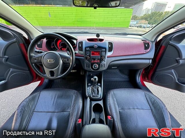 Киа Черато 2011 в Киеве на Automoto.ua Красный Киа Черато, объемом двигателя 2 л и пробегом 220 тыс. км за 7900 $, фото 5 на Automoto.ua