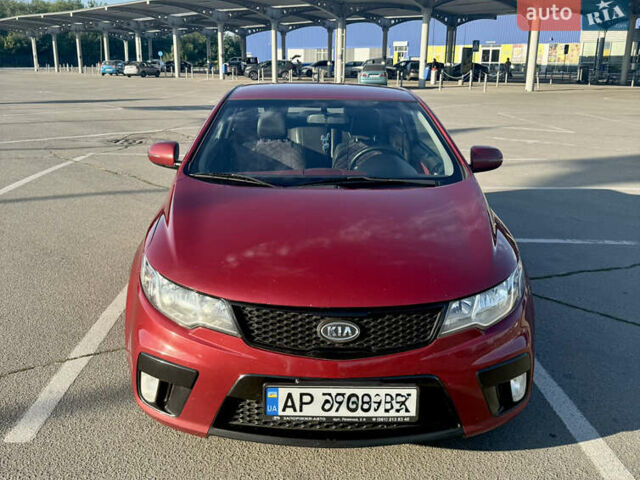 Красный Киа Черато, объемом двигателя 2 л и пробегом 155 тыс. км за 8900 $, фото 9 на Automoto.ua