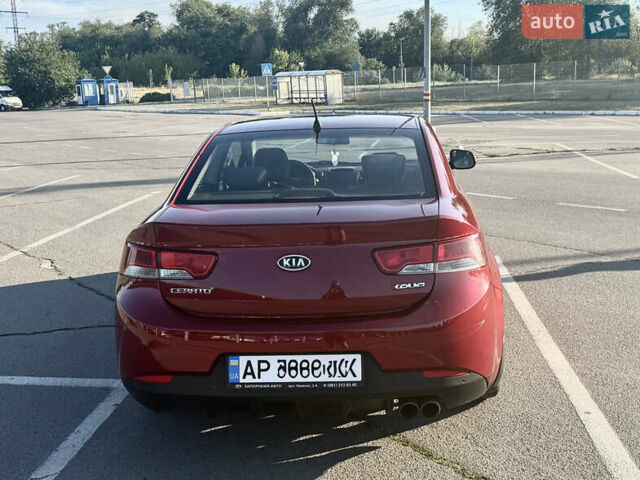 Красный Киа Черато, объемом двигателя 2 л и пробегом 155 тыс. км за 8900 $, фото 3 на Automoto.ua