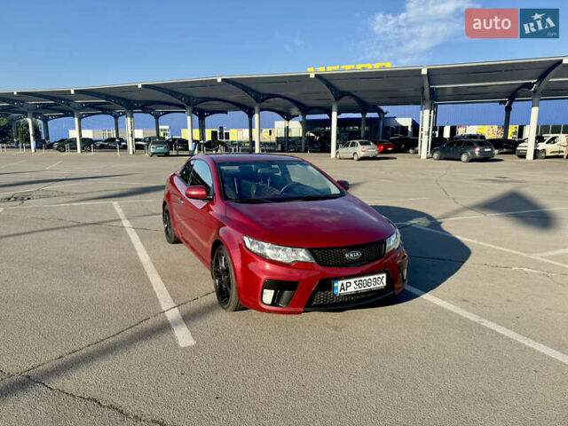 Красный Киа Черато, объемом двигателя 2 л и пробегом 155 тыс. км за 8900 $, фото 1 на Automoto.ua