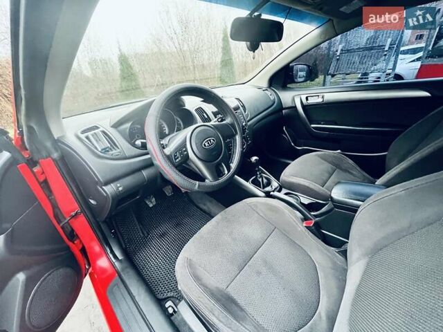Красный Киа Черато, объемом двигателя 1.6 л и пробегом 293 тыс. км за 7100 $, фото 17 на Automoto.ua