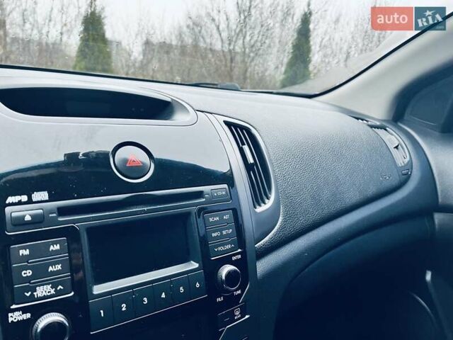 Красный Киа Черато, объемом двигателя 1.6 л и пробегом 293 тыс. км за 7100 $, фото 21 на Automoto.ua