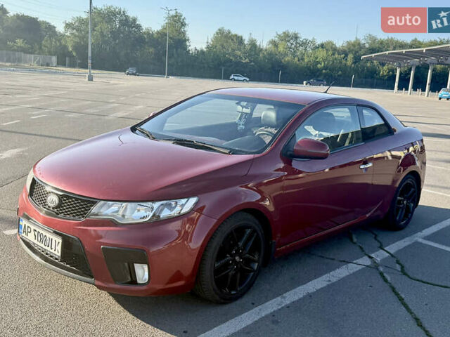 Красный Киа Черато, объемом двигателя 2 л и пробегом 155 тыс. км за 8900 $, фото 4 на Automoto.ua