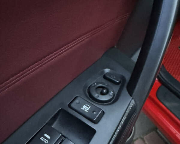 Красный Киа Черато, объемом двигателя 2 л и пробегом 165 тыс. км за 9700 $, фото 21 на Automoto.ua