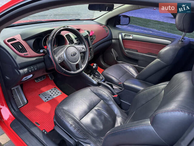 Красный Киа Черато, объемом двигателя 2 л и пробегом 165 тыс. км за 9700 $, фото 9 на Automoto.ua