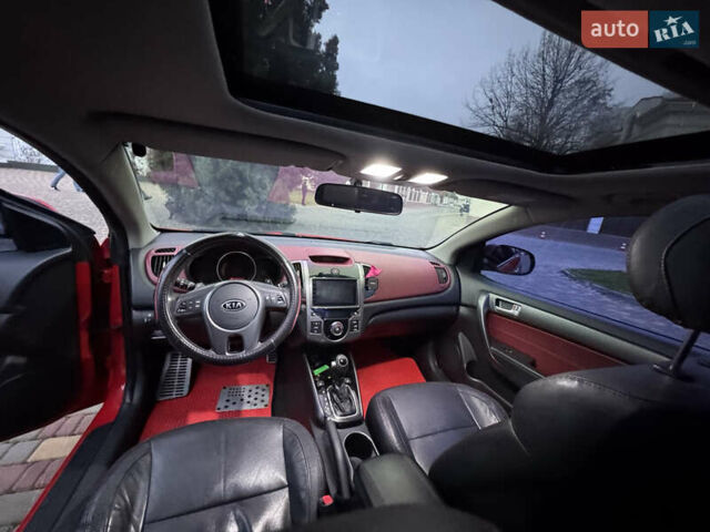Красный Киа Черато, объемом двигателя 2 л и пробегом 165 тыс. км за 9700 $, фото 11 на Automoto.ua