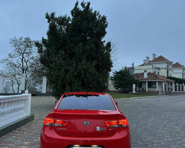 Красный Киа Черато, объемом двигателя 2 л и пробегом 165 тыс. км за 9700 $, фото 18 на Automoto.ua