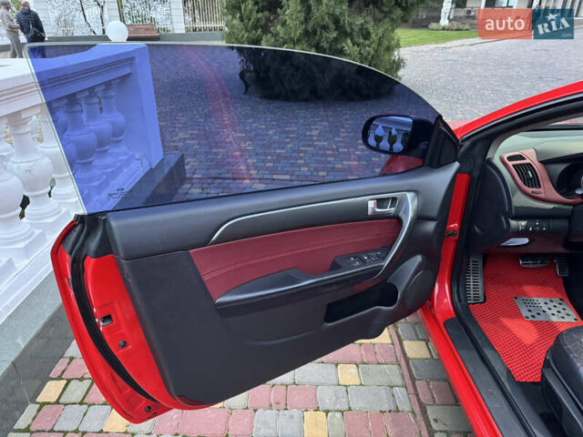 Красный Киа Черато, объемом двигателя 2 л и пробегом 165 тыс. км за 9700 $, фото 10 на Automoto.ua