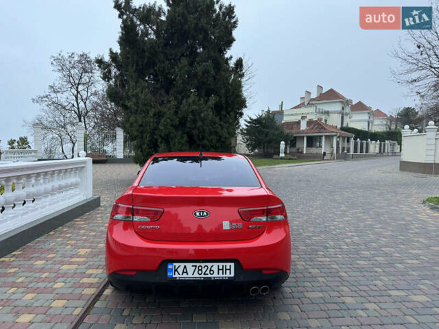 Красный Киа Черато, объемом двигателя 2 л и пробегом 165 тыс. км за 9700 $, фото 5 на Automoto.ua