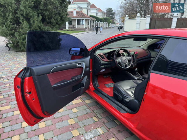 Красный Киа Черато, объемом двигателя 2 л и пробегом 165 тыс. км за 9700 $, фото 8 на Automoto.ua
