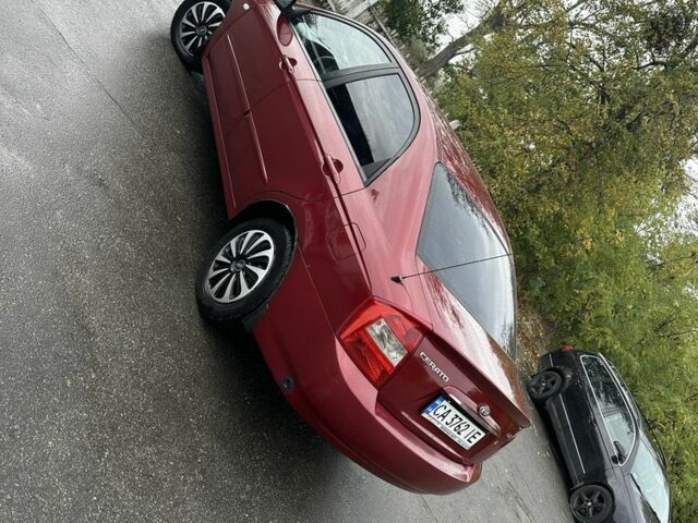 Красный Киа Черато, объемом двигателя 1.6 л и пробегом 228 тыс. км за 3850 $, фото 6 на Automoto.ua