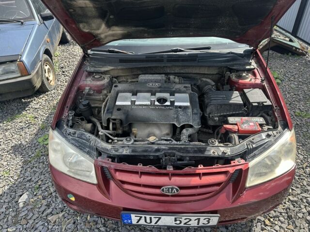 Красный Киа Черато, объемом двигателя 0 л и пробегом 123 тыс. км за 1500 $, фото 1 на Automoto.ua