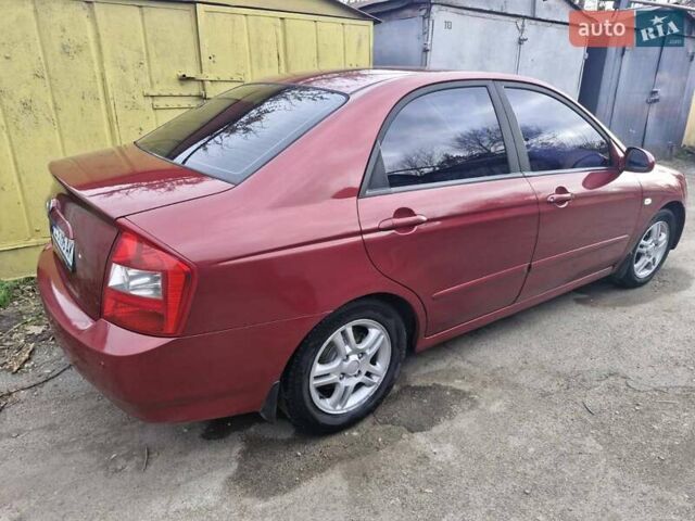 Красный Киа Черато, объемом двигателя 2 л и пробегом 233 тыс. км за 4700 $, фото 10 на Automoto.ua