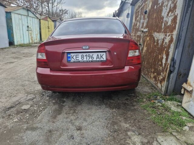 Красный Киа Черато, объемом двигателя 2 л и пробегом 233 тыс. км за 4700 $, фото 4 на Automoto.ua