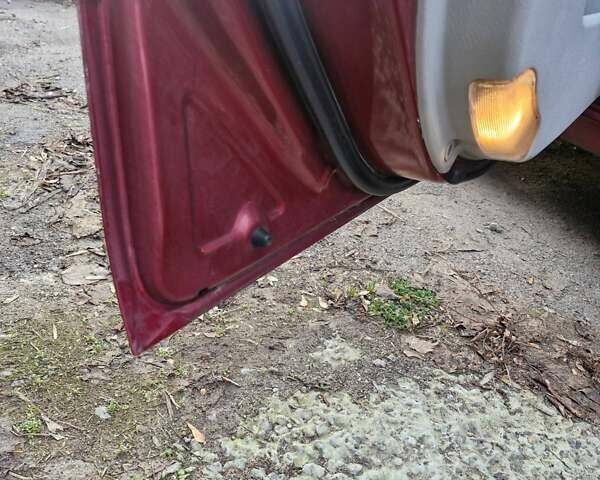 Красный Киа Черато, объемом двигателя 2 л и пробегом 233 тыс. км за 4700 $, фото 20 на Automoto.ua