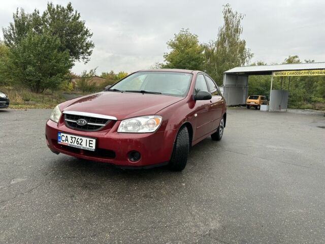 Красный Киа Черато, объемом двигателя 1.6 л и пробегом 228 тыс. км за 3850 $, фото 4 на Automoto.ua