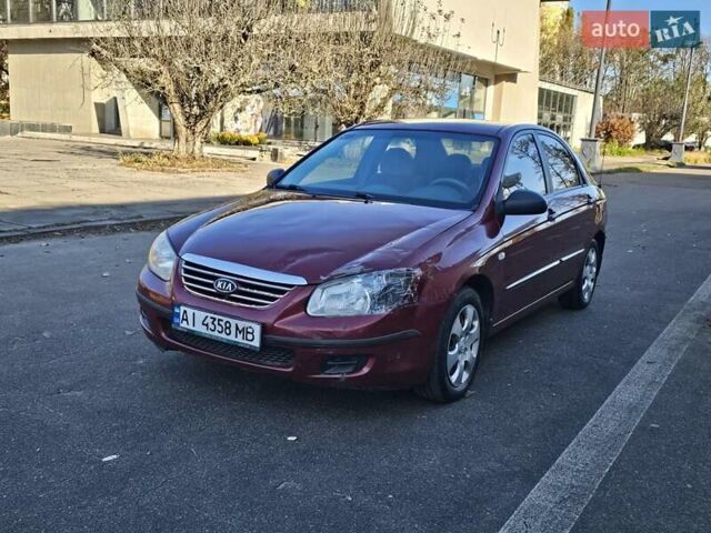 Красный Киа Черато, объемом двигателя 1.6 л и пробегом 200 тыс. км за 2600 $, фото 10 на Automoto.ua