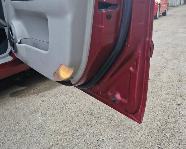 Красный Киа Черато, объемом двигателя 2 л и пробегом 233 тыс. км за 4700 $, фото 24 на Automoto.ua