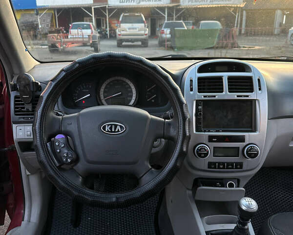 Красный Киа Черато, объемом двигателя 1.6 л и пробегом 212 тыс. км за 4500 $, фото 27 на Automoto.ua