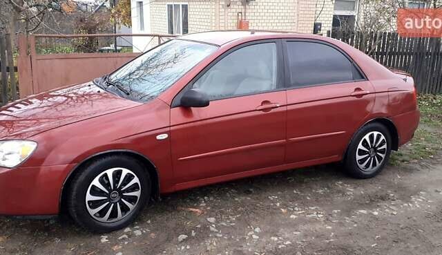 Красный Киа Черато, объемом двигателя 1.6 л и пробегом 229 тыс. км за 4500 $, фото 5 на Automoto.ua