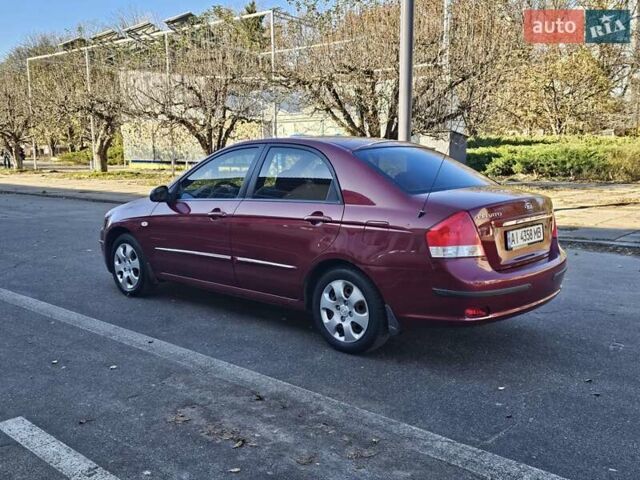 Красный Киа Черато, объемом двигателя 1.6 л и пробегом 200 тыс. км за 2600 $, фото 8 на Automoto.ua