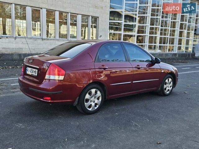 Красный Киа Черато, объемом двигателя 1.6 л и пробегом 200 тыс. км за 2600 $, фото 5 на Automoto.ua