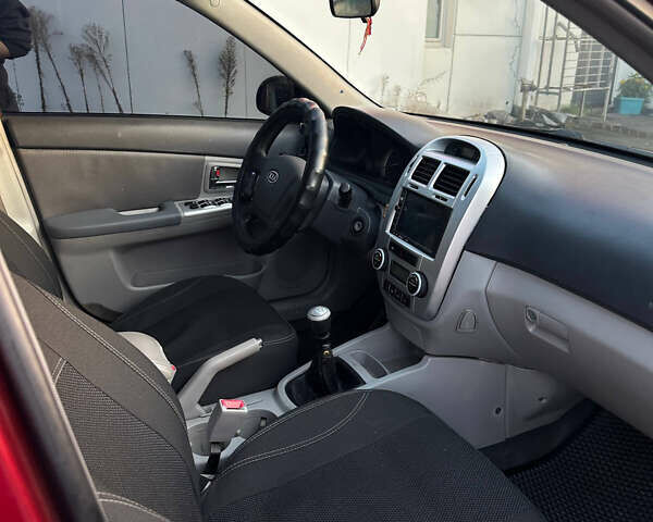 Красный Киа Черато, объемом двигателя 1.6 л и пробегом 212 тыс. км за 4500 $, фото 19 на Automoto.ua