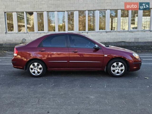 Красный Киа Черато, объемом двигателя 1.6 л и пробегом 200 тыс. км за 2600 $, фото 3 на Automoto.ua