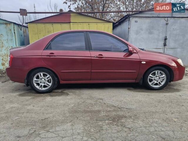 Красный Киа Черато, объемом двигателя 2 л и пробегом 233 тыс. км за 4700 $, фото 11 на Automoto.ua