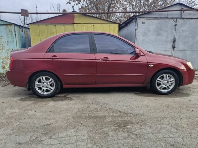 Красный Киа Черато, объемом двигателя 2 л и пробегом 233 тыс. км за 4700 $, фото 5 на Automoto.ua