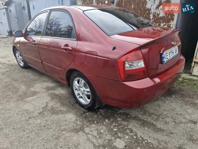 Красный Киа Черато, объемом двигателя 2 л и пробегом 233 тыс. км за 4700 $, фото 7 на Automoto.ua