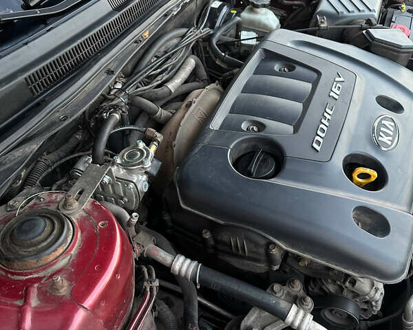 Красный Киа Черато, объемом двигателя 1.6 л и пробегом 212 тыс. км за 4500 $, фото 34 на Automoto.ua