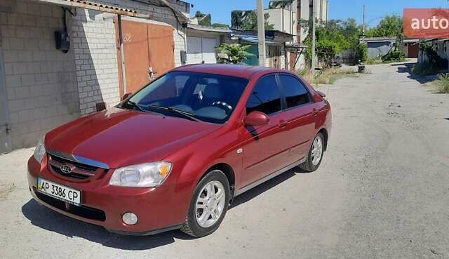 Красный Киа Черато, объемом двигателя 2 л и пробегом 144 тыс. км за 5400 $, фото 9 на Automoto.ua