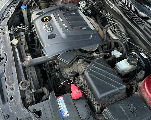 Красный Киа Черато, объемом двигателя 1.6 л и пробегом 212 тыс. км за 4500 $, фото 35 на Automoto.ua