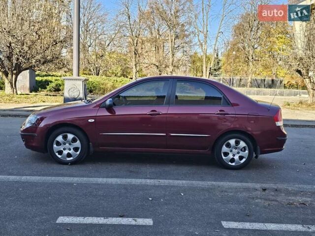 Красный Киа Черато, объемом двигателя 1.6 л и пробегом 200 тыс. км за 2600 $, фото 8 на Automoto.ua