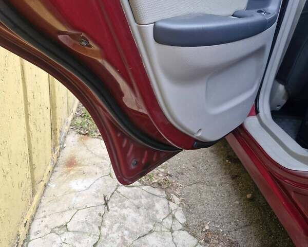 Красный Киа Черато, объемом двигателя 2 л и пробегом 233 тыс. км за 4700 $, фото 22 на Automoto.ua